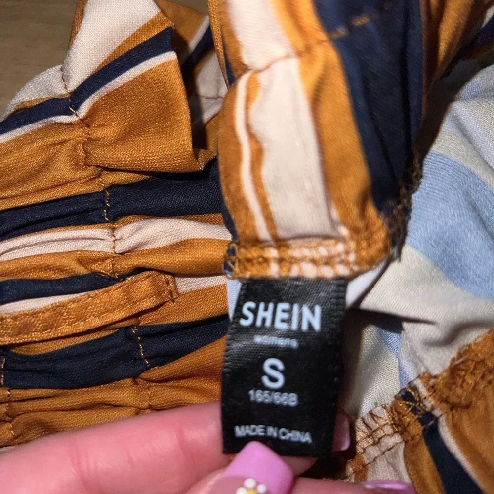 striped paper bag shorts